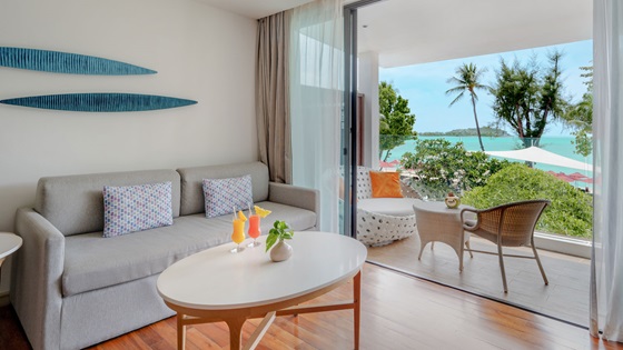 Living Area and Balcony in Grand Deluxe Ocean View - アマリ  コ サムイ