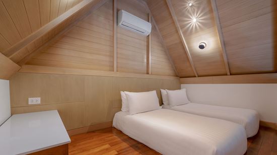 Twin Beds in Deluxe Family Twin Beds in Deluxe Family