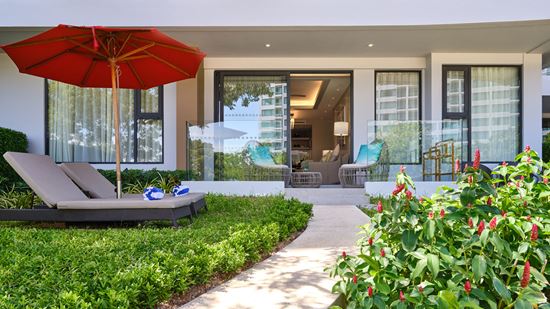 Loungers and balcony in Club Amari Suite Poolside