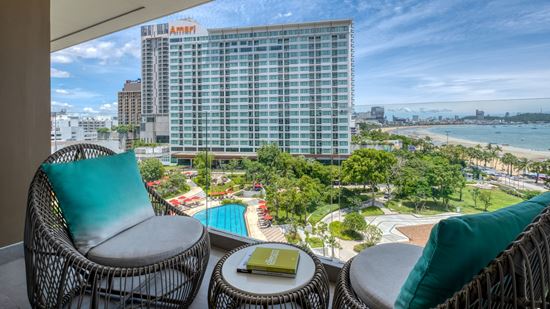 Balcony with seating area in Club Amari Suite