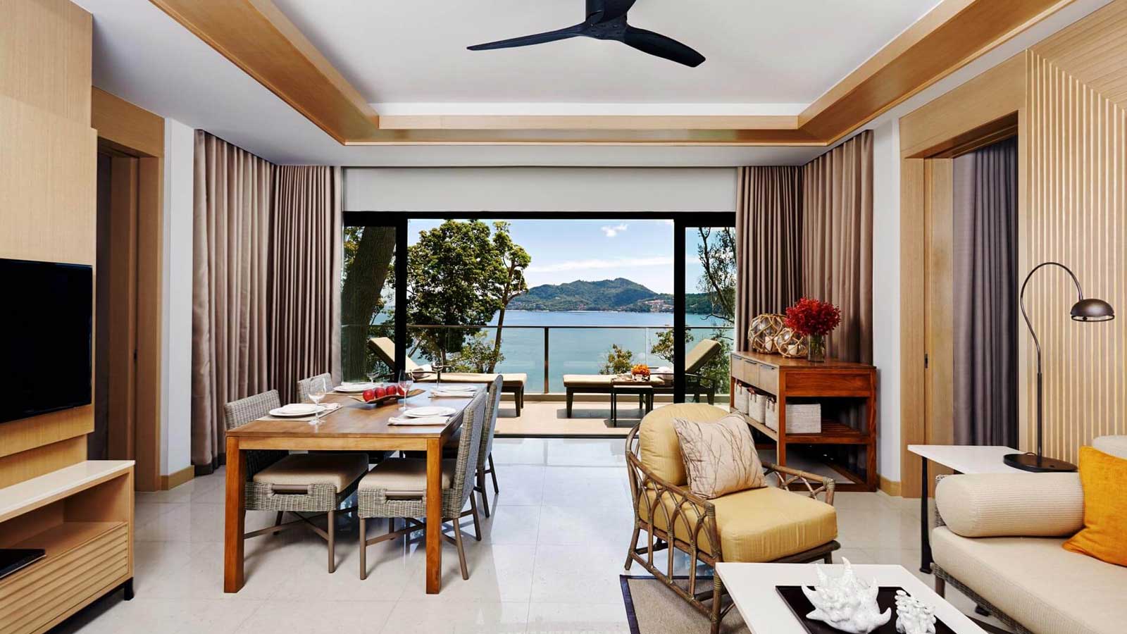 Separate living and dining room in Club Two Bedroom Suite Ocean View Balcony - Amari Phuket