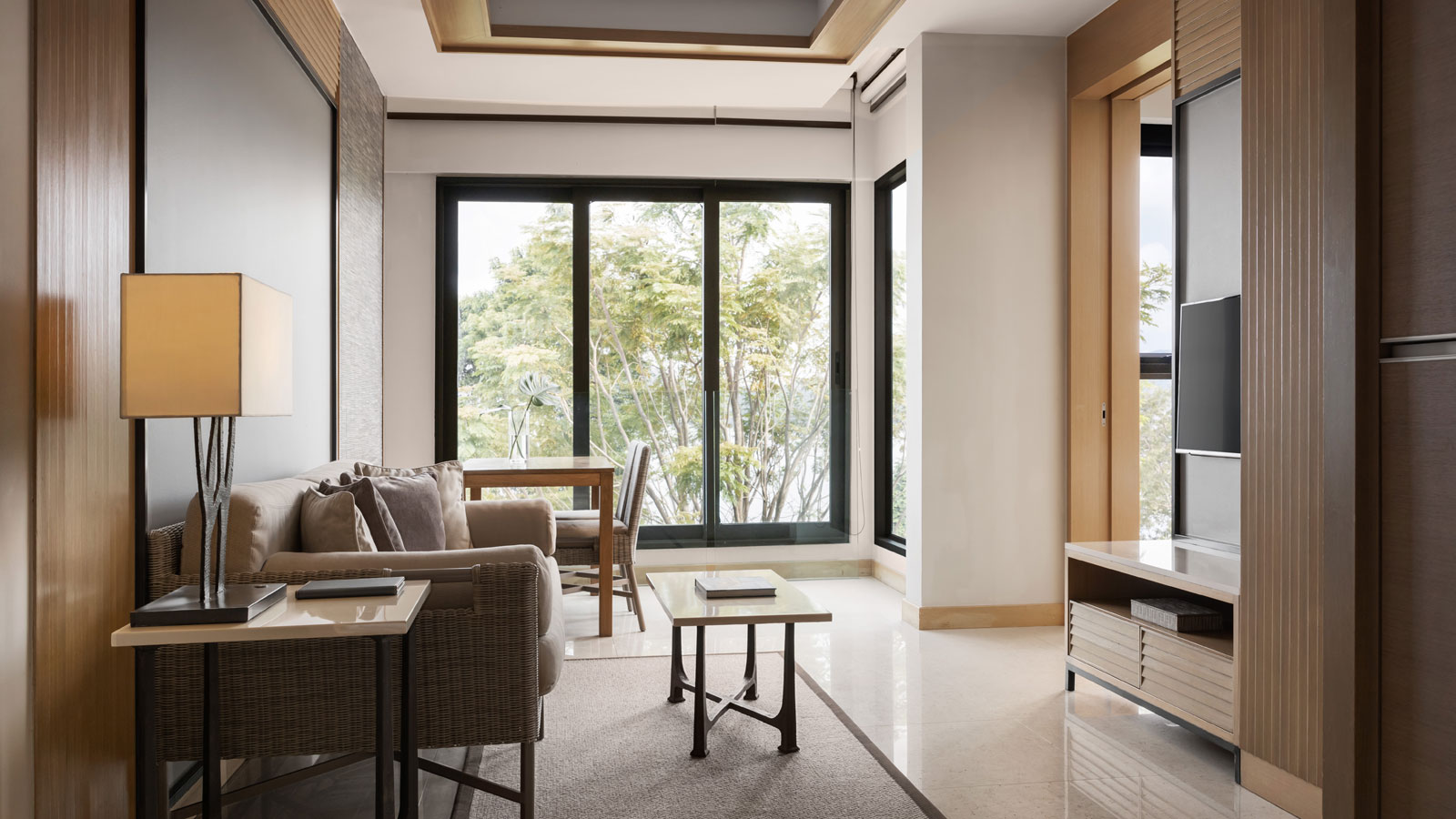 Flat-screen TV in One Bedroom Suite Ocean View Coral Lounge - Amari Phuket