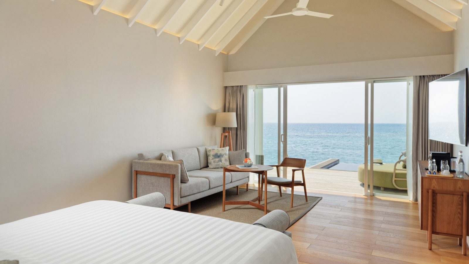 King bed in Deluxe Ocean Pool Villa - Amari Raaya Maldives