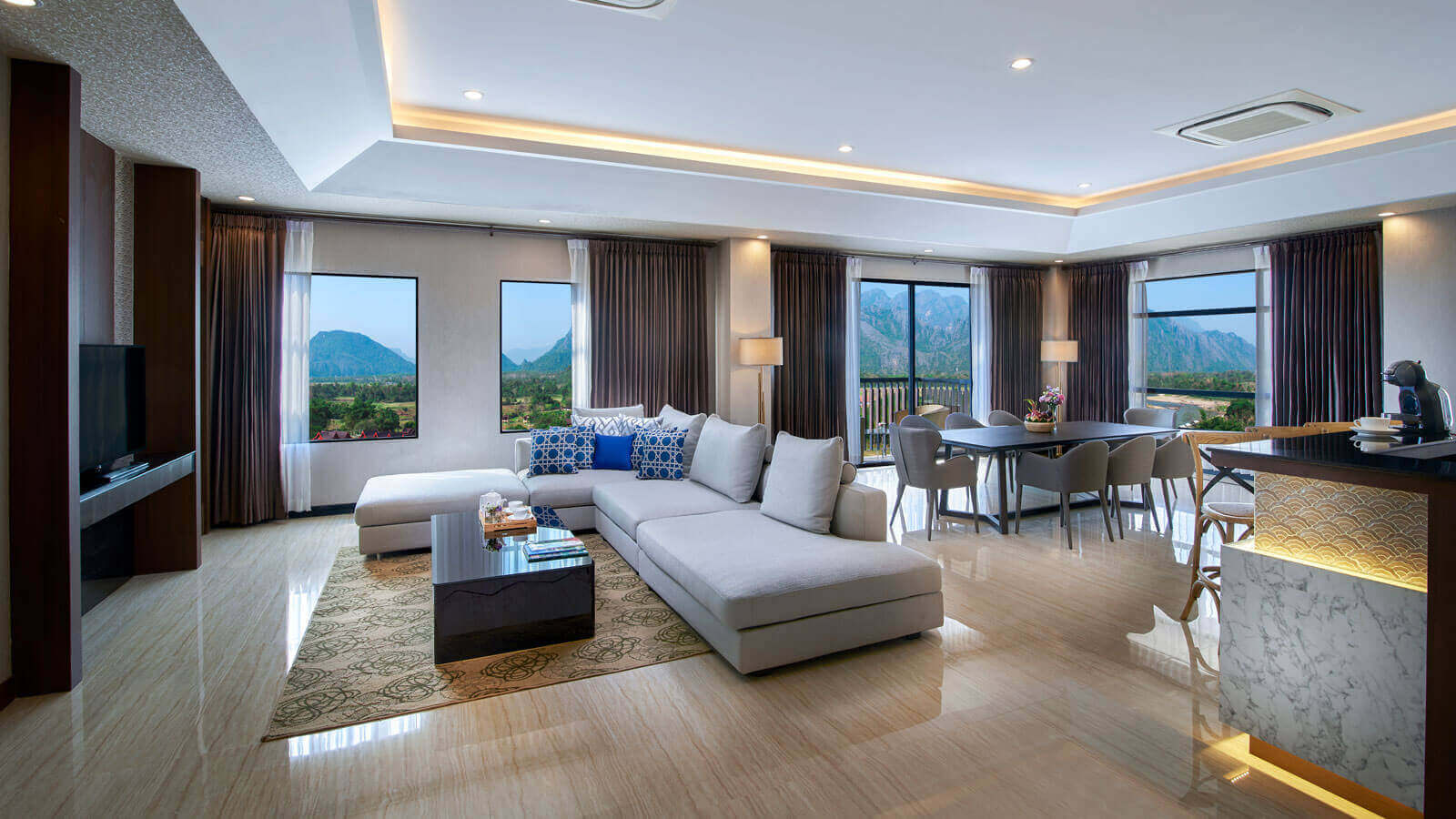 Kitchenette and dining area in Executive One Bedroom Suite River View with Balcony - Amari Vang Vieng