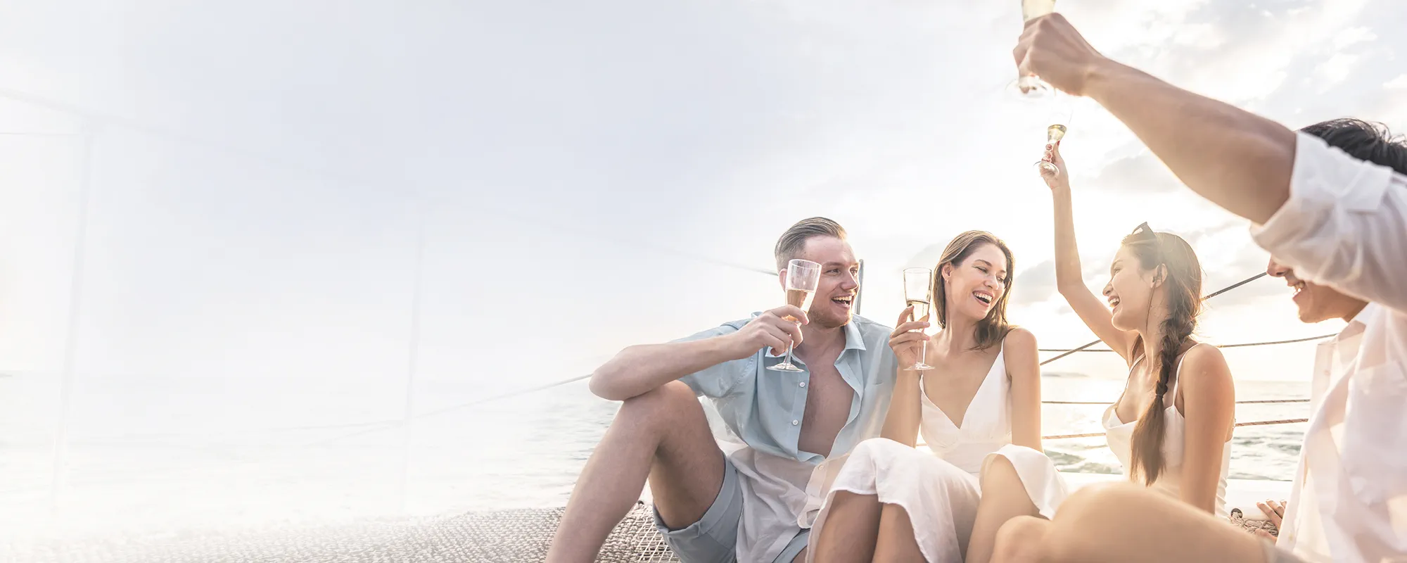 A group of people celebrating at the beach