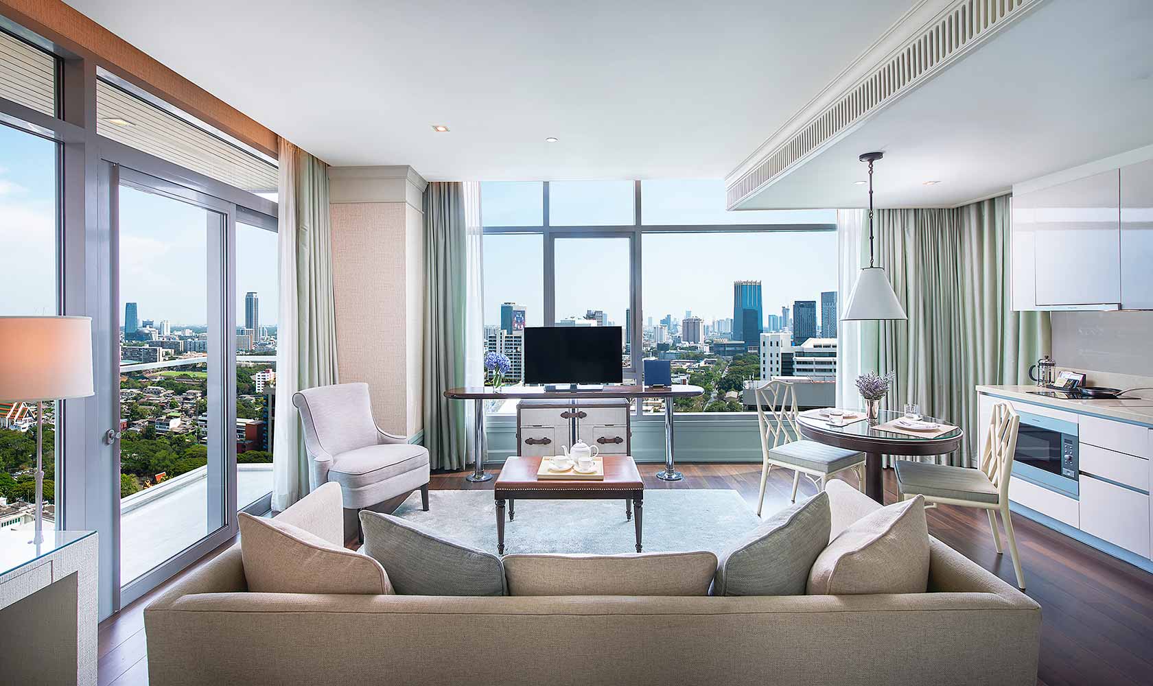 Separate living and dining room in One Bedroom Corner Suite - Oriental Residence Bangkok