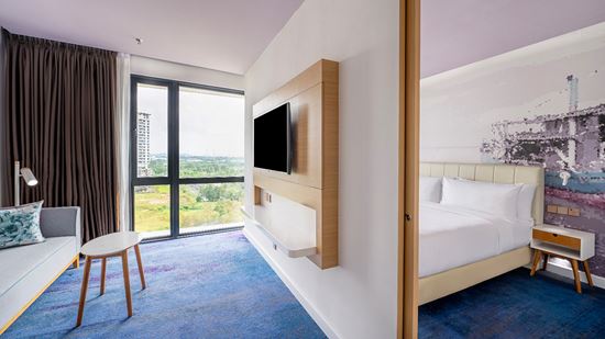 Junior Suite Lake View - Living Area and Bedroom