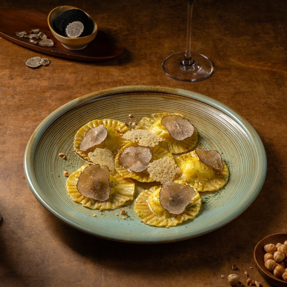 Tortelli di Castelmagno al burro nocciola e Tartufo Nero