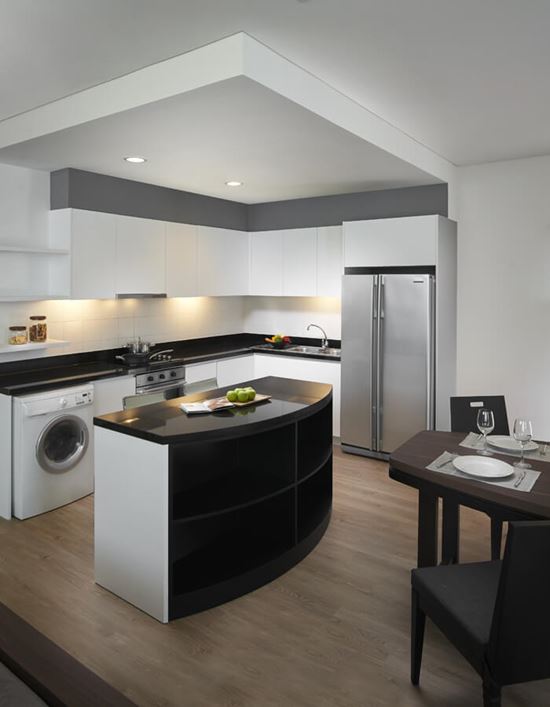 Three Bedroom Deluxe - Kitchen and Dining Area Three Bedroom Deluxe - Kitchen and Dining Area
